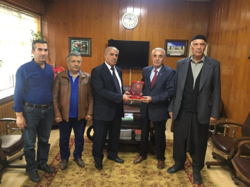 Gazi ve Şehit Yakınları Vakfından ESKKK Başkanı Evren’e plaket
